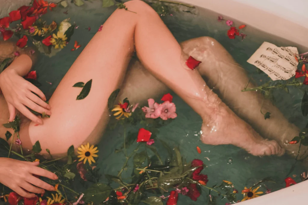 Woman lying in the bathtub